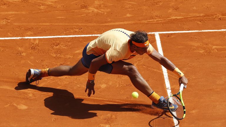 Spain's Rafael Nadal returns the ball to Britain's Andy Murray