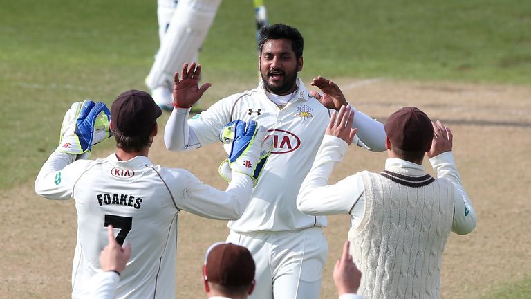 Ravi Rampaul is mobbed after dismissing Chris Read during the County Championship division one match between Nottinghamshire and Surrey at the Trent Bridge