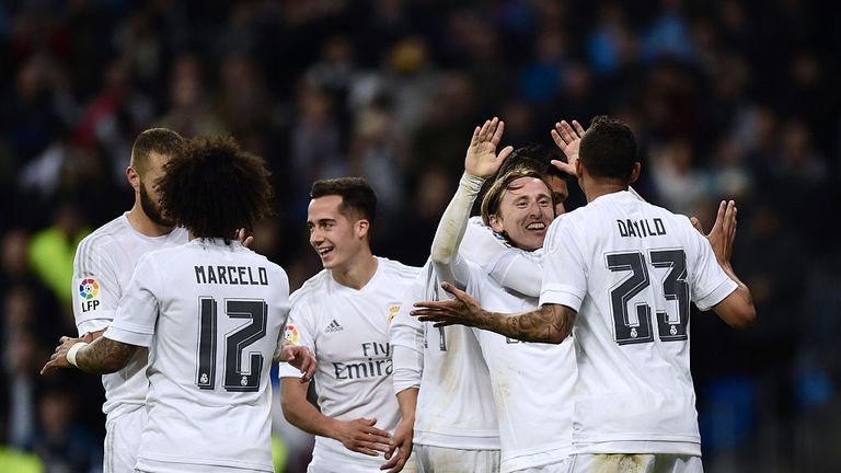 Luka Modric (2nd R) celebrates a goal during the Spanish league football match Real Madrid vs Villarreal at the Santiago Bernabeu stadium