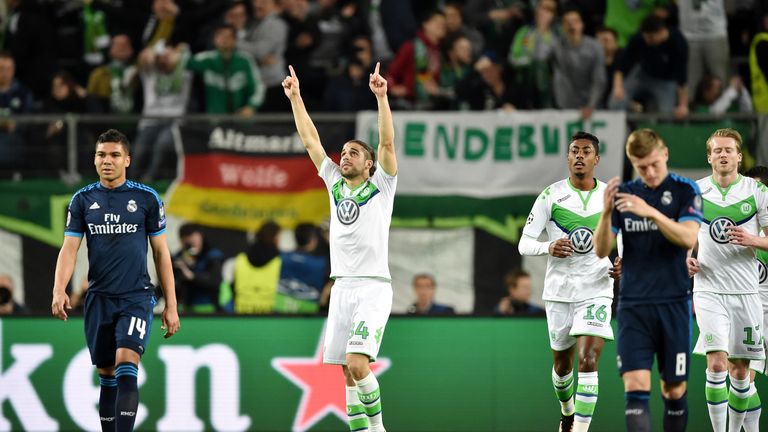Ricardo Rodriguez celebrates scoring his team's first goal during the Champions League Quarter Final First Leg match between VfL Wolfsburg and Real Madrid 