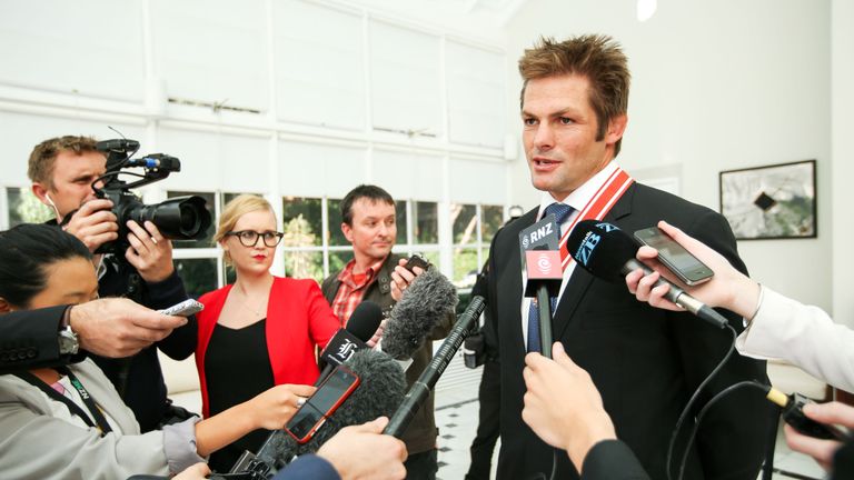 Former All Black captain Richie McCaw speaks to media after receiving the insignia of a Member of the Order of New Zealand