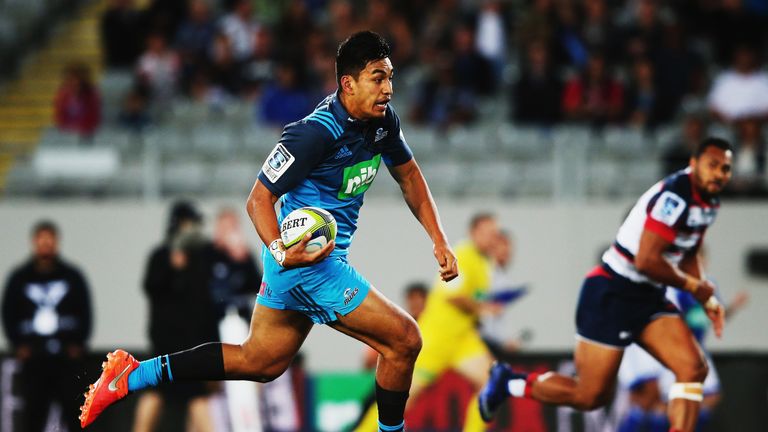 Rieko Ioane of the Blues makes a break during their win over the Rebels