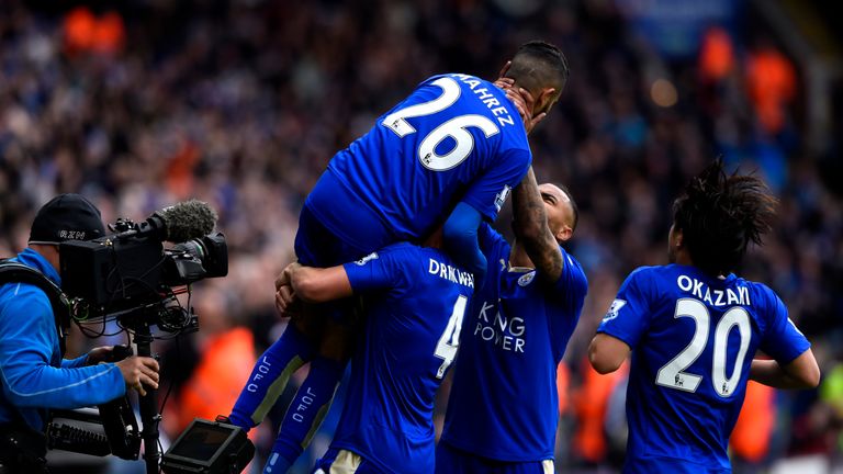 Riyad Mahrez celebrates with his team-mates after opening the Swansea