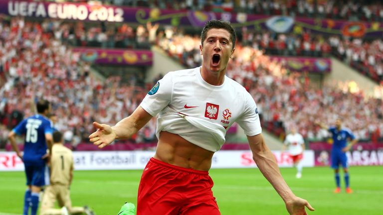 WARSAW, POLAND - JUNE 08:  Robert Lewandowski of Poland celebrates scoring the opening goal during 