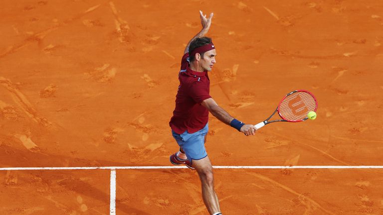 Roger Federer of Switzerland plays a backhand against Roberto Bautista Agut of Spain on day five of Monte Carlo Masters