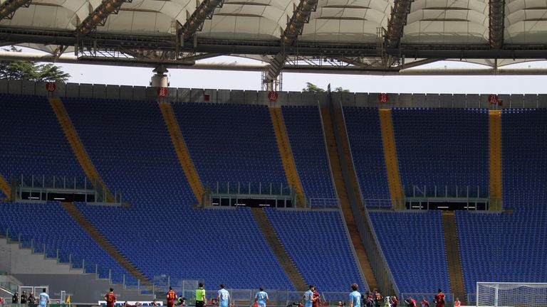 Large sections of the Stadio Olimpico were empty as many fans stayed away from the Rome derby in protest at new security measures