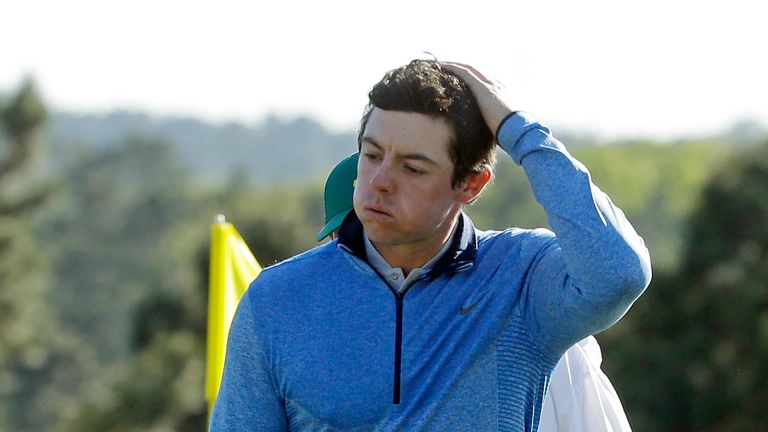 Rory McIlroy walks off the 18th green after after his final round 