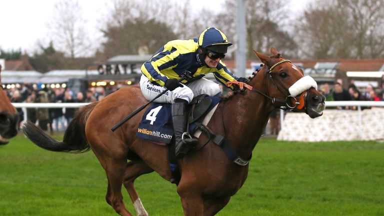 David Bass on The Last Samuri on his way to winning the 2:35 William Hill Handicap Chase.