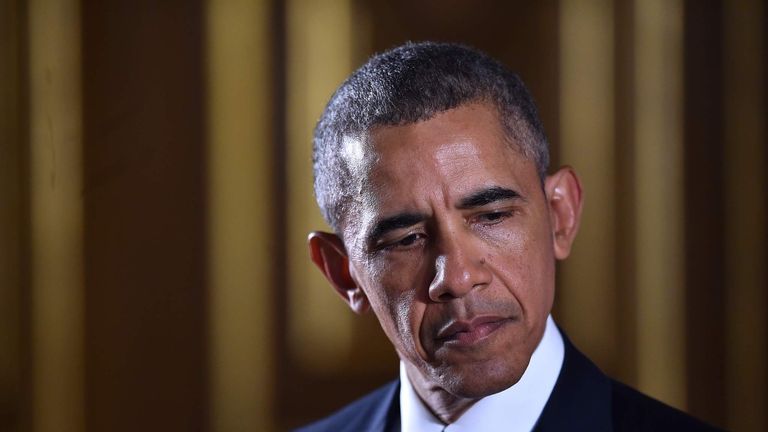 US President Barack Obama speaks during a press conference at the Foreign and Commonwealth Office in central London with Britain's Prime Minister David Cameron (unseen) following a meeting at Downing Street, in London