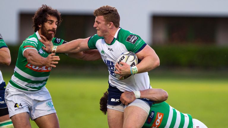 Connacht's Peter Robb fends off a challenge