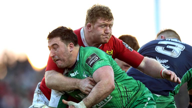 Munster's Stephen Archer tackles Denis Buckley of Connacht