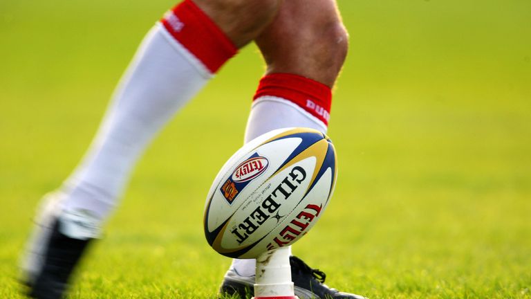 General view of a Rugby League ball on a kicking tee 