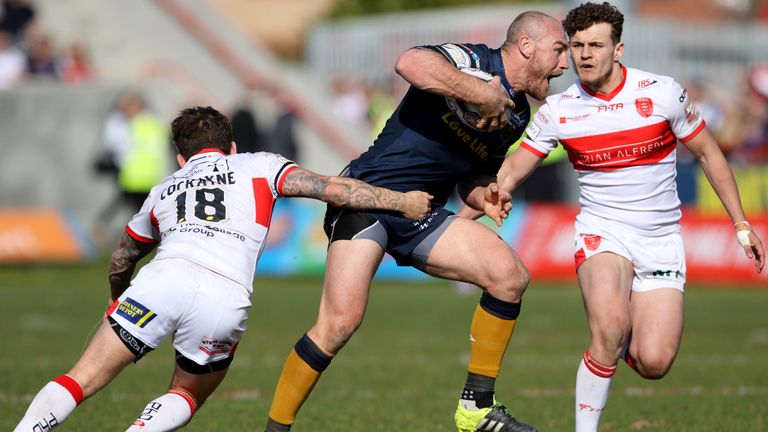 Hull FC's Gareth Ellis powers past Hull KR's Ben Cockayane