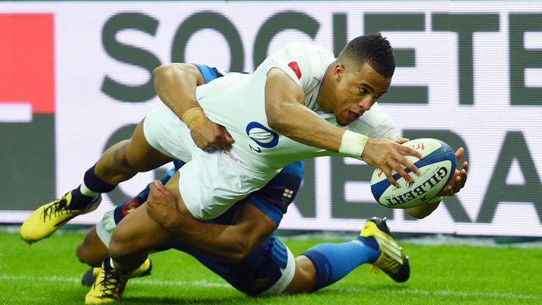 Anthony Watson of England scores his team's third try