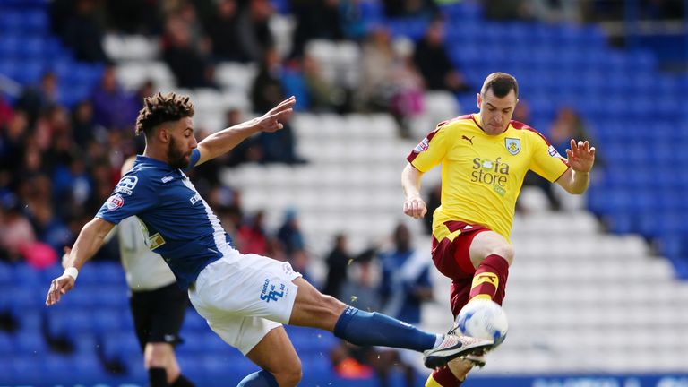 Ryan Shotton and Dean Marney battle for the ball