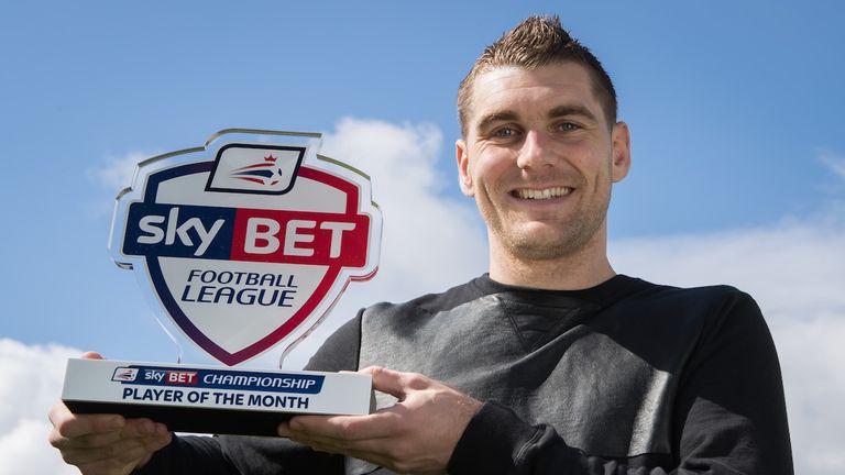Sam Vokes of Burnley with Sky Bet Championship Player of the Month Award for March