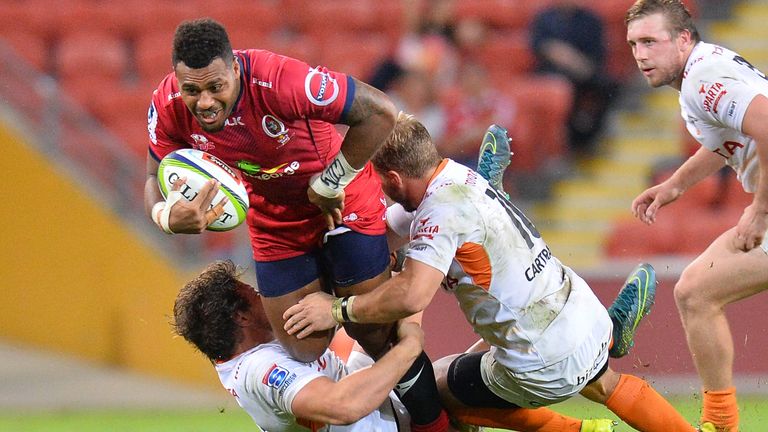 BRISBANE, AUSTRALIA - APRIL 30:  Samu Kerevi of the Reds attempts to break through the defence during the round 10 Super Rugby match between the Reds and t