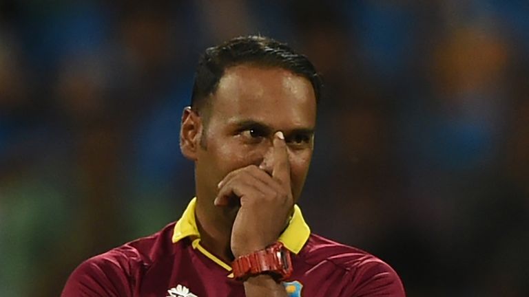 West Indies's Samuel Badree reacts after being hit for a boundary by India's Ajinkya Rahane during the World T20 cricket tournamen