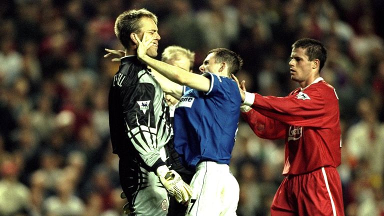 27 Sep 1999:  Sander Westerveld of Liverpool wrestles with Francis Jeffers of Everton during the Premier League match as Jamie Carragher looks on