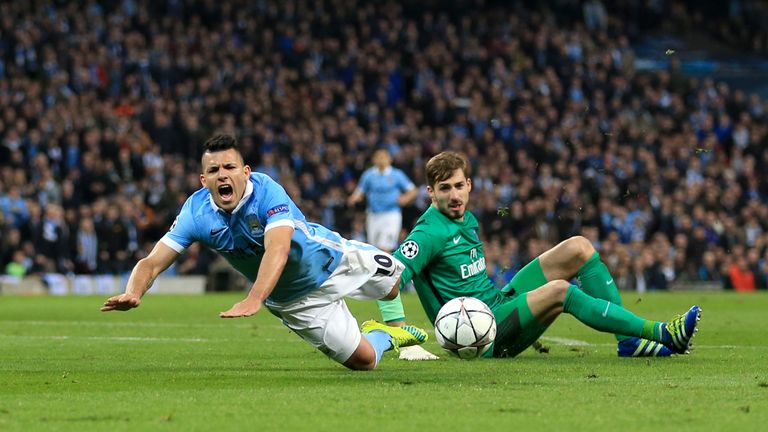 Manchester City's Sergio Aguero is fouled by Paris Saint-Germain goalkeeper Kevin Trapp to win his side a penalty during the UEFA Champions League Quarter 