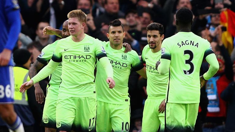 Sergio Aguero of Manchester City celebrates with team mates after scoring his third goal during the Premier League match v Chelsea