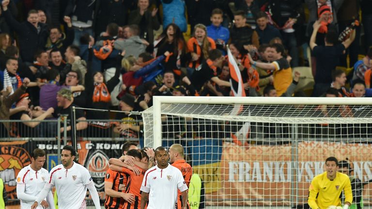 Shakhtar Donetsks players celebrate after scoring during the UEFA European League, semi-final first leg football match between Sevilla and Shakhtar Donetsk