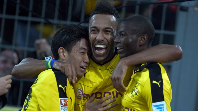 Shinji Kagawa, Pierre-Emerick Aubameyang and Adrian Ramos celebrate a goal for Borussia Dortmund in the 3-2 win over Werder Bremen.