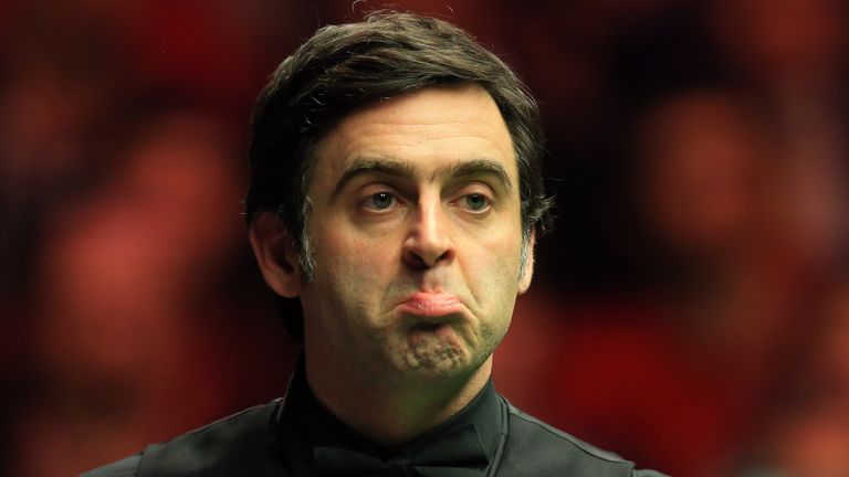 Ronnie O'Sullivan battled into the second round at the Crucible on Monday