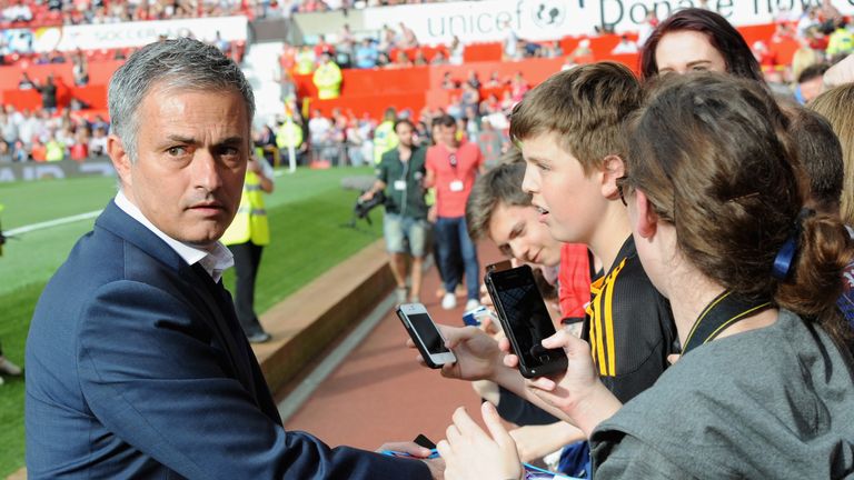 Rest of the World manager Jose Mourinho signs autographs for fans ahead of Soccer Aid 2014 