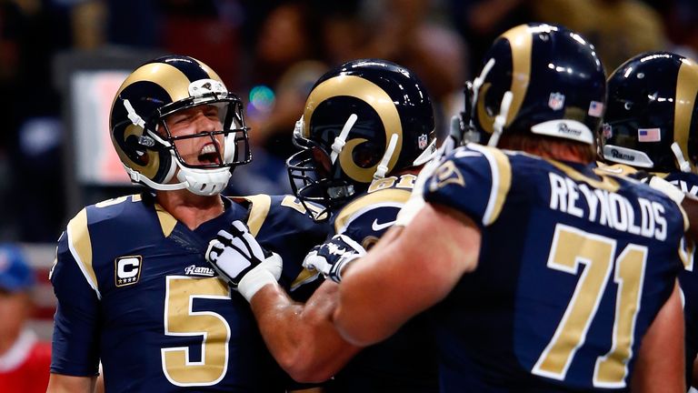 ST LOUIS, MO - SEPTEMBER 13:  Nick Foles #5 of the St. Louis Rams celebrates a third quarter touchdown against the Seattle Seahawks at the Edward Jones Dom