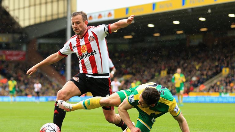 Lee Cattermole of Sunderland is challenged by Matt Jarvis of Norwich City