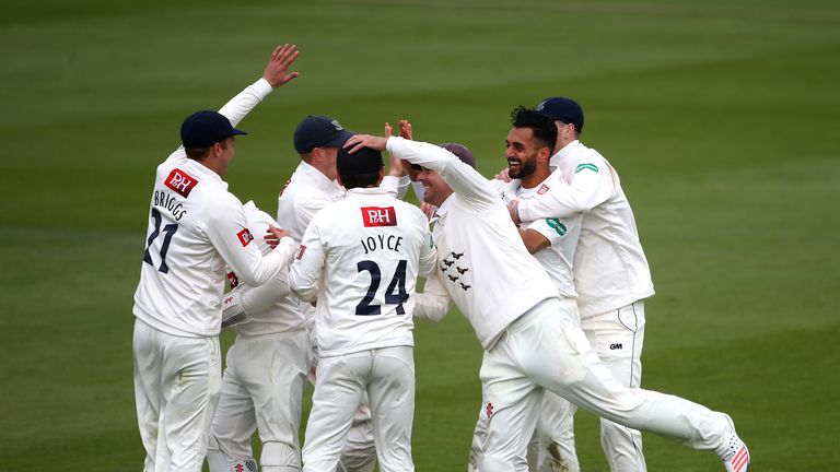 HOVE, ENGLAND - APRIL 18: Ajmal Shahzad (2nd R) of Sussex celebrates after taking the wicket of Jesse Ryder of Essex during day two