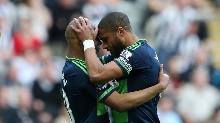 Swansea's Ashley Williams (right) reacts with team-mate Andre Ayew after missing a chance  against Newcastle