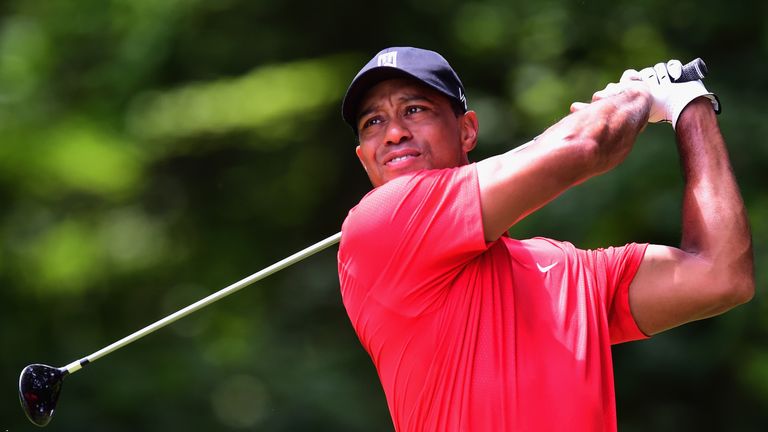 Tiger Woods tees off on the second hole during the final round of the Wyndham Championship