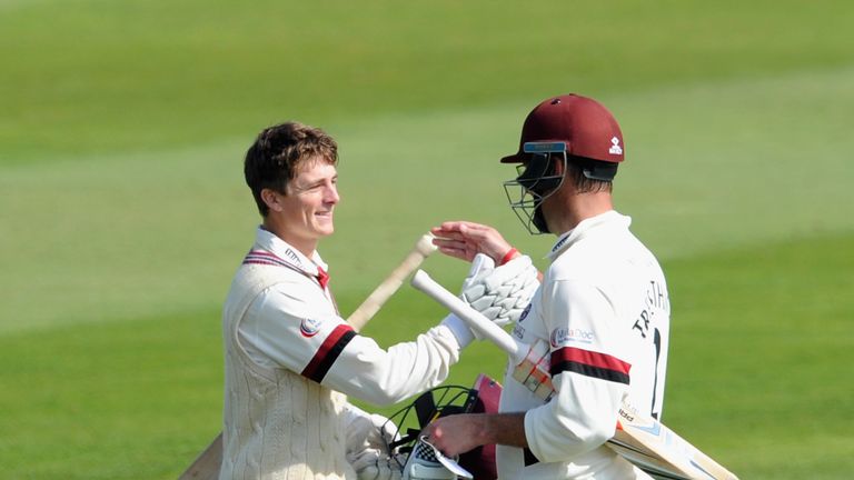 TAUNTON, ENGLAND - SEPTEMBER 10:  Tom Abell of Somerset is congratulated by Marcus Trescothick after scoring his maiden first class hundred