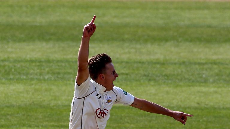 NOTTINGHAM, ENGLAND - APRIL 13:  Tom Curran of Surrey celebrates after taking the wicket of Brendan Taylor