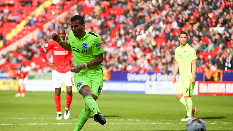 Tomer Hemed scores Brighton's third goal in their 3-1 win over Charlton