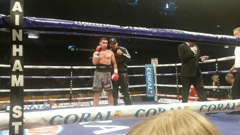 Tony Bange with his trainer after victory at Copper Box