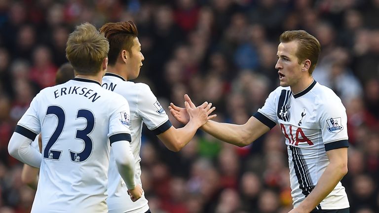 Tottenham striker Harry Kane (right) celebrates after scoring against Liverpool