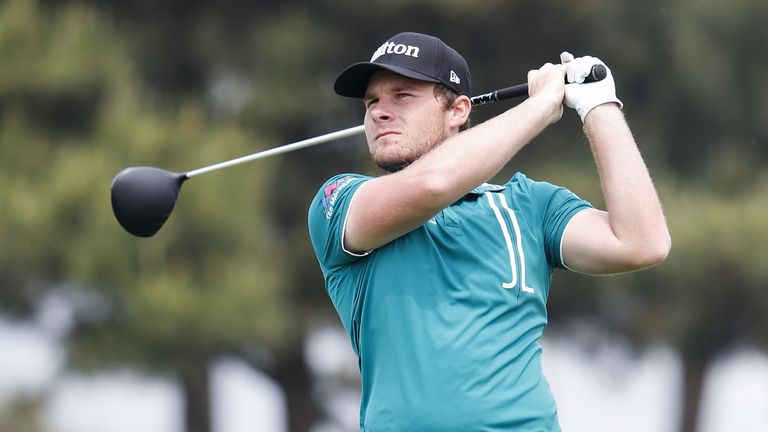 Tyrrell Hatton of England plays a shot during the second round of the Volvo China open at Topwin Golf and Country Club