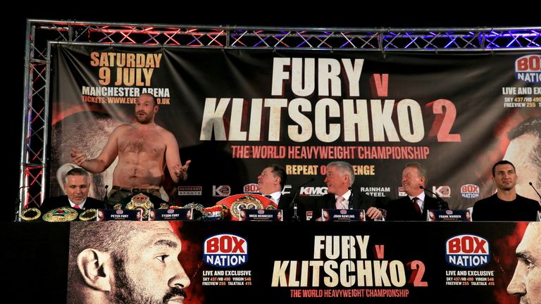 Tyson Fury (left) and Wladimir Klitschko during the press conference at Manchester Arena.
