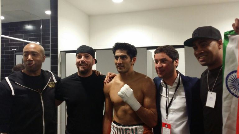 Virender Singh poses with his team after winning at the Copper Box