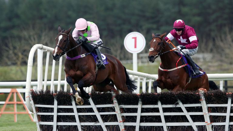 Vroum Vroum Mag ridden by Ruby Walsh (left) clears the last before winning the Betdaq Punchestown Champion Hurdle during day four of the Punchestown Festiv