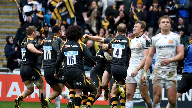 Exeter's players were disconsolate as Wasps celebrated the win