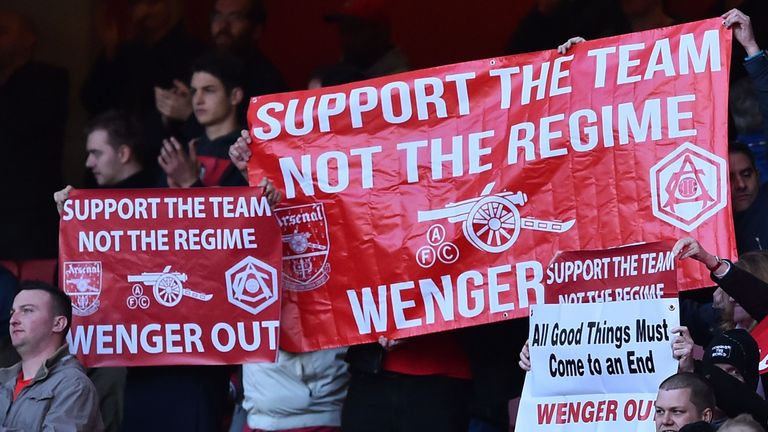 Arsenal fans held up banners calling for "Wenger Out" during their match against Norwich