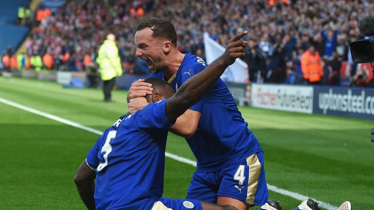 Wes Morgan of Leicester City (5) celebrates with team mate Danny Drinkwater as he scores their first goal during the Barcla