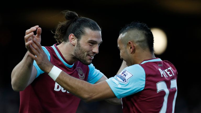 Andy Carroll celebrates with Dimitri Payet after opening the scoring