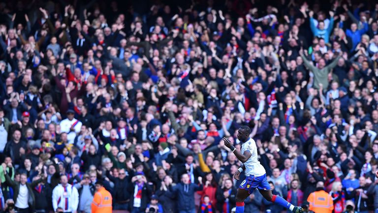 Crystal Palace's French-born Congolese midfielder Yannick Bolasie celebrates scoring his team's first goal