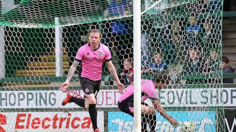 Nicky Adams celebrates his goal for Northampton at Yeovil
