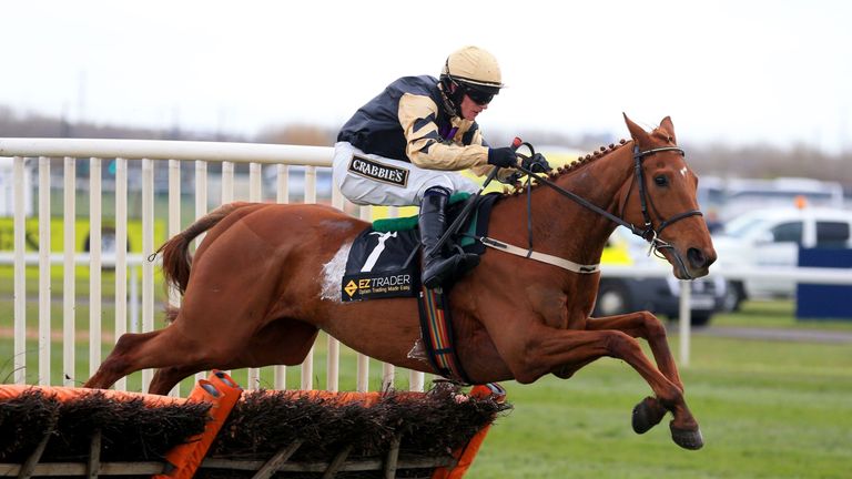 Yorkhill ridden by Paul Townend jumps the final fence on his way to winning the EZ Trader Mersey Novices’ Hurdle during Grand National Day of the Crabbie